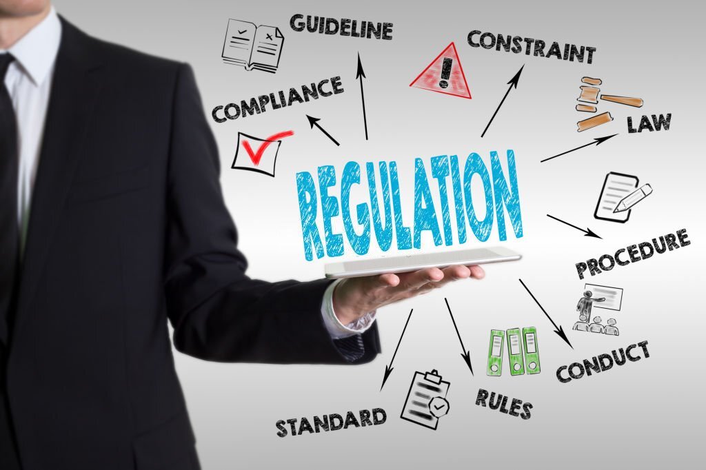 Regulation procedures man holding info graphic regulation chart