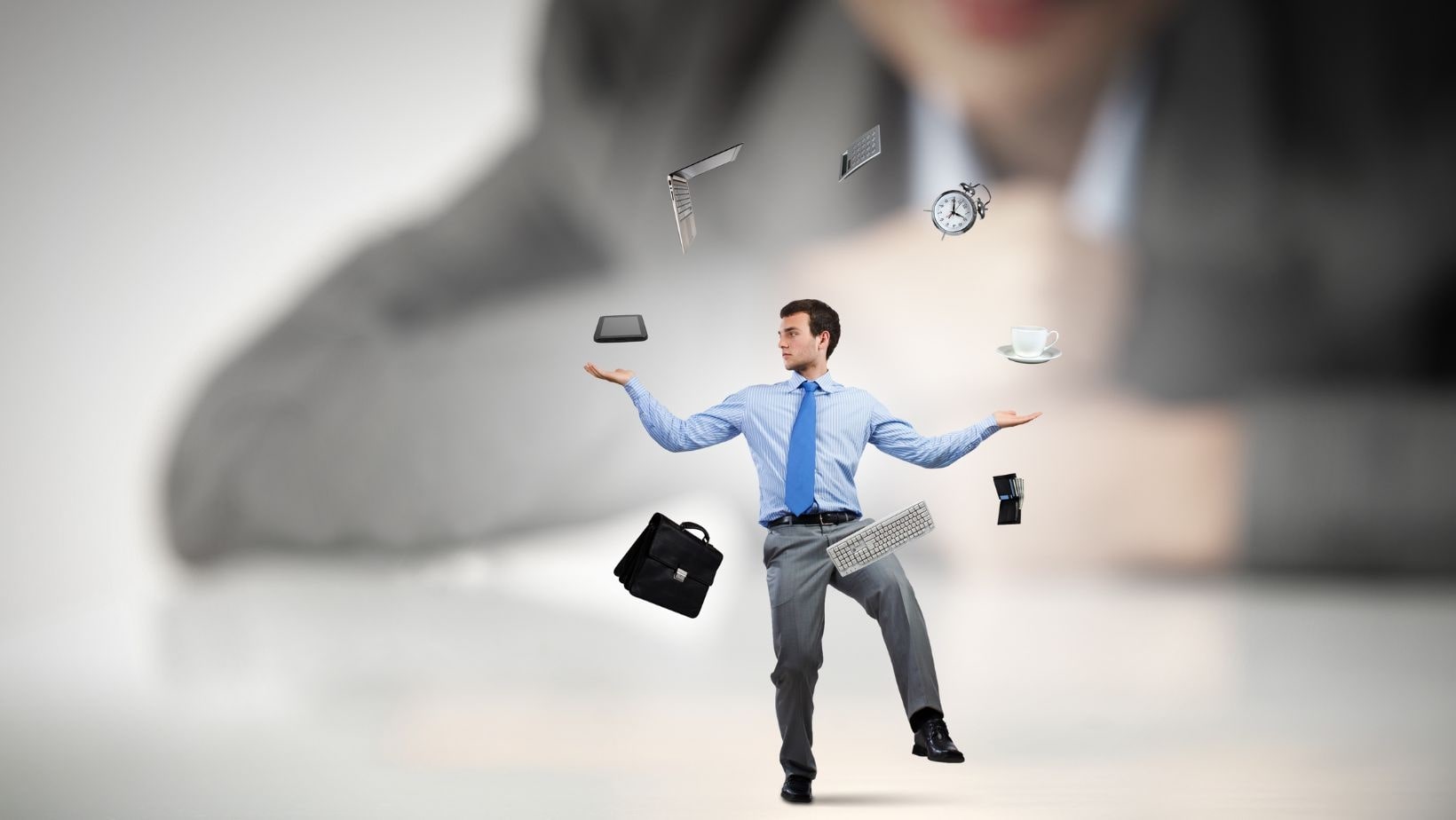 Relational Skills man juggling with various office objects