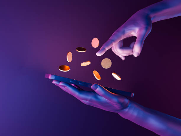 Two hands with gold coins floating on purple background